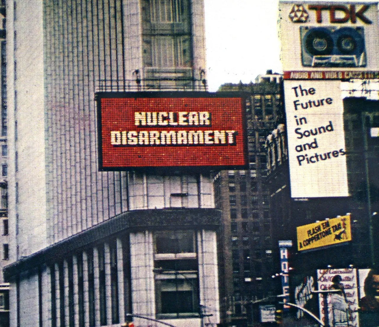 Billboard in New York City Times Square with the headline "Nuclear Disarmament"